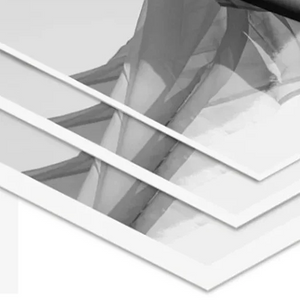 Black and white fine art photo prints on thick Ilford paper with white borders