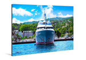 Acrylic photo print featuring a large yacht docked at a vibrant marina, lush hills behind.