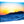 Glossy aluminum Dibond photo print of a vivid seascape with sunset and rugged coastline.