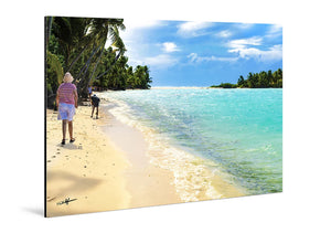 Aluminum photo print of tropical beach scene with palm trees, turquoise water, and people walking on sand