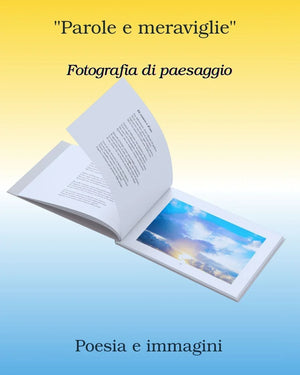 Open photo book with landscape photography and poetry on a blue and yellow background