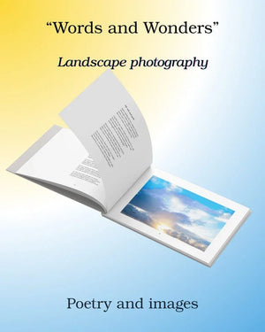 Open photo book featuring landscape photography and poetry against a yellow-blue gradient background