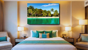 Modern hotel bedroom with tropical beach photo wall art above bed, turquoise accents throughout the room.